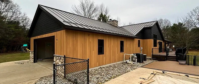 Metal Roof Replacement and Siding by Veteran Roofing and Exteriors, LLC.